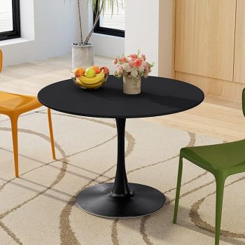 Round Eames Dining Table with wooden top and iconic tripod-style legs in a modern dining room.