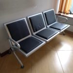 Heavy padded 3-link office bench with durable frame, providing comfort and support for long hours of work in modern office environments.