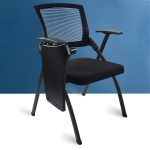 A fold-up training chair with a writing pad, designed for easy storage and comfortable seating, perfect for training rooms or seminars.