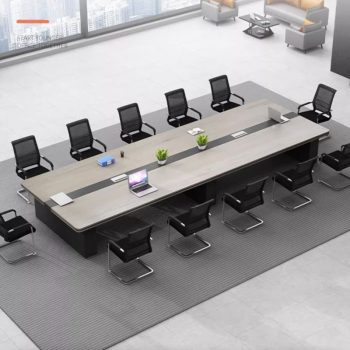 An executive meeting table for 14-16 people in a professional office setting, featuring a large, sleek design and a polished surface.