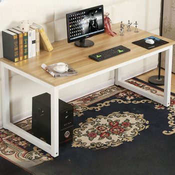 A stylish engineered wood home office table with a modern design, perfect for a functional and elegant workspace.