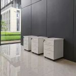 Compact 3-drawer pedestal storage unit with sleek design, ideal for organizing office supplies and personal items.