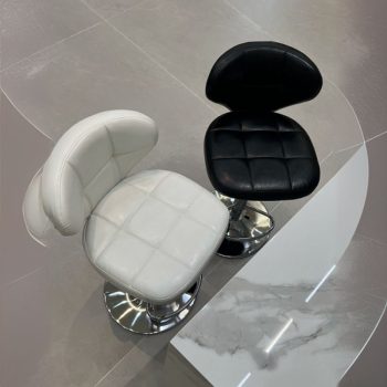 Simple black leather square bar stool with a modern design and sturdy base.