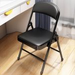 A black foldable office chair with a sleek design, offering portability and space-saving functionality, perfect for flexible office setups.