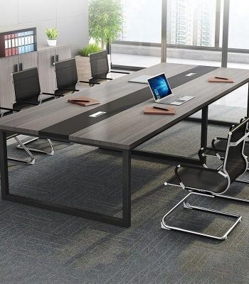 A large, modern 10-12 seater office boardroom table with a sleek design, ideal for corporate meetings and professional gatherings.