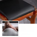 A wooden visitor’s office chair with a comfortable padded seat, sturdy wooden frame, and armrests, offering a stylish seating option for office guests.