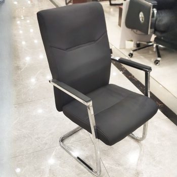 A stylish modern leather office guest chair with a sleek design, comfortable seating, and sturdy frame, perfect for professional settings.