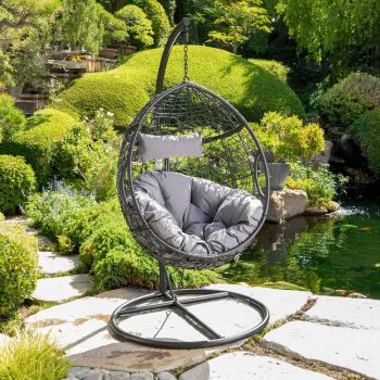 A comfortable backyard hammock swing with soft fabric and sturdy frame, perfect for relaxing outdoors in your garden or patio.