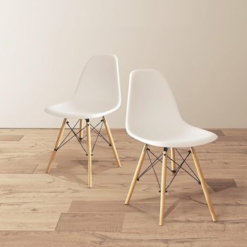 An elegant Eames modern dining chair with a sleek design and molded plastic seat, perfect for contemporary dining rooms and stylish interiors.