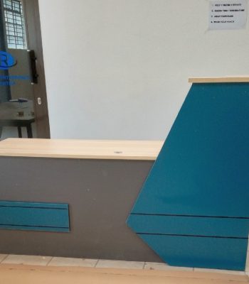 A 2.4-meter reception desk with modern design, offering ample space for office tasks and customer interaction.