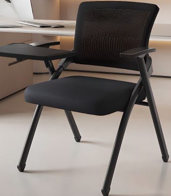 An office meeting chair with a writing pad, designed for comfort and convenience during meetings, presentations, or training sessions.
