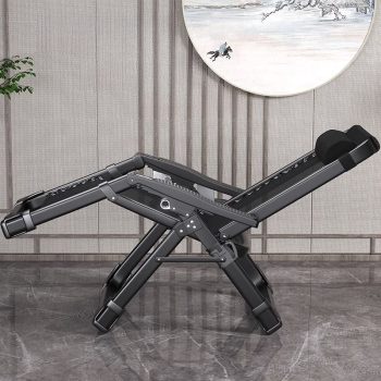 A fold-away recliner armchair with a comfortable headrest, featuring a modern design for easy storage and relaxation in any space.