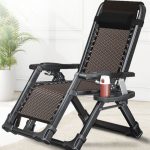 A fold-away recliner armchair with a comfortable headrest, featuring a modern design for easy storage and relaxation in any space.