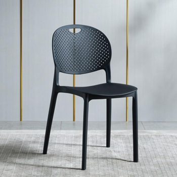 Nordic plastic dining chair with a minimalist design, featuring sleek lines and a comfortable seat, perfect for modern dining rooms.