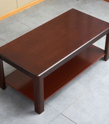 An elegant wooden coffee table featuring a refined design with a smooth finish, perfect for living rooms or cozy spaces.