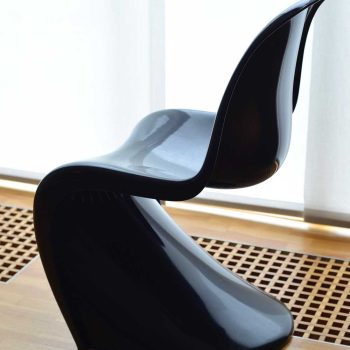 Verner Panton Modern Dining Chair with sleek, curved design and vibrant color, perfect for adding style and comfort to any dining room.