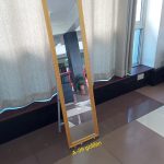 Elegant full-length mirror with a minimalist design, ideal for modern home décor.