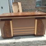 Modern executive desk with ample storage and elegant aesthetics.