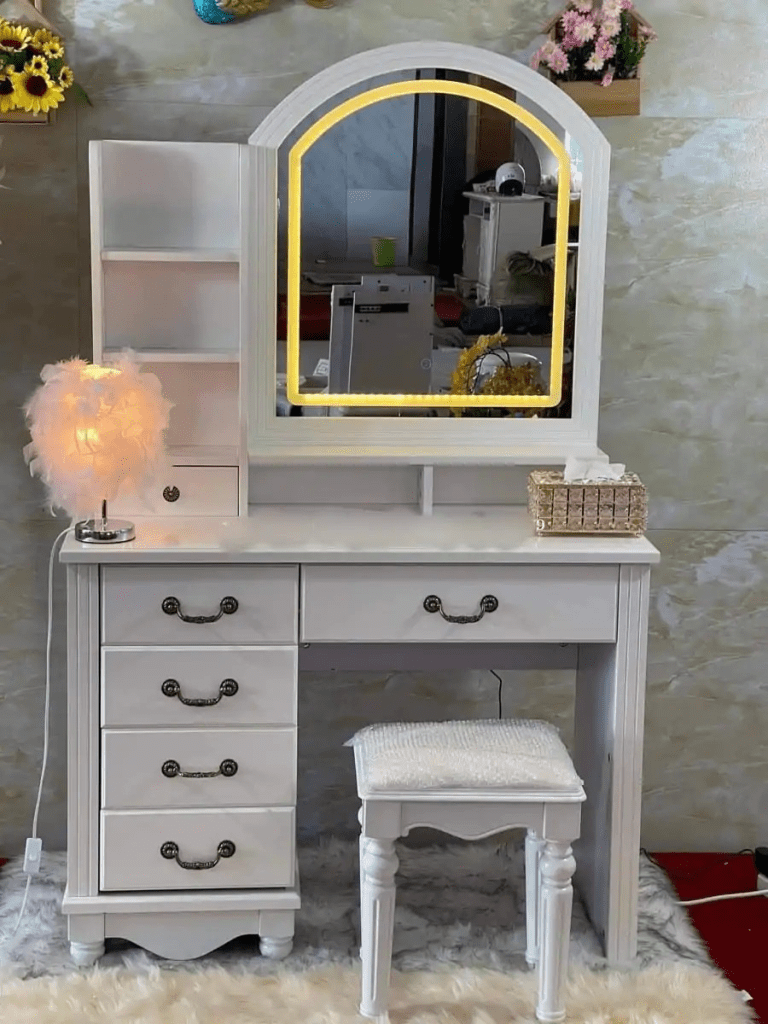 Modern elegant dressing table with sleek design and ample storage.