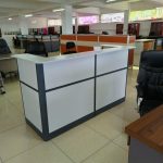 reception desk, front desk, reception counter, lobby desk, reception table, reception workstation, modern reception desk, minimalist reception desk, executive reception desk, luxury reception desk, commercial reception desk, small reception desk, large reception desk, wooden reception desk, metal reception desk, glass reception desk, marble reception desk, stone reception desk, laminate reception desk, veneer reception desk, rustic reception desk, industrial reception desk, contemporary reception desk, classic reception desk, traditional reception desk, curved reception desk, straight reception desk, L‑shaped reception desk, U‑shaped reception desk, modular reception desk, height adjustable reception desk, standing reception desk, clinic reception desk, hotel reception desk, salon reception desk, spa reception desk, office lobby desk, showroom reception desk, retailer reception counter, front office desk, desk with storage, reception desk with drawers, reception desk with cabinet, reception desk with shelves, reception desk with lockable drawers, reception desk with wire management, reception desk with grommets, reception desk with countertop ledge, reception desk with raised counter, reception desk with branding panel, reception desk with logo space, reception desk with back storage, hidden storage reception desk, reception desk with workstation, double receptionist desk, single user reception desk, one‑person reception desk, multi‑person reception desk, compact reception desk, reception desk for small spaces, space‑saving reception desk, budget reception desk, premium reception desk, custom reception desk, bespoke reception desk, made to order reception desk, ready‑to‑assemble reception desk, flat pack reception desk, reception desk delivery Kenya, reception desk Nairobi, reception desk East Africa, reception desk affordable, reception desk luxury finish, high gloss reception desk, matte finish reception desk, gloss laminate desk, woodgrain finish reception desk, walnut reception desk, oak reception desk, cherry reception desk, maple reception desk, mahogany reception desk, pine reception desk, beech reception desk, teak reception desk, engineered wood reception desk, MDF reception desk, compact laminate reception desk, solid wood reception desk, mixed material reception desk, metal frame reception desk, stainless steel reception desk, steel base reception desk, aluminum frame reception desk, glass top reception desk, frosted glass reception desk, tempered glass desk, stone top reception desk, granite reception desk, quartz reception desk, marble slab reception desk, concrete reception desk, epoxy reception desk top, LED lit reception desk, illuminated reception counter, backlit front panel desk, reception desk color white, desk color black, desk color grey, desk color brown, two‑tone reception desk, contrasting trim desk, desk with accent panel, custom color reception desk, reception desk with finish options, eco‑friendly reception desk, sustainable materials desk, recycled materials reception desk, earth tone desk finish, natural finish desk, walnut veneer reception desk, oak veneer reception desk, rustic finish desk, distressed wood desk, weathered wood desk, modern veneer desk, glossy lacquer desk, brushed metal trim desk, chrome accents desk, brass hardware reception desk, curved front reception desk, wave front desk, bow front desk, semi‑circle lobby desk, round reception desk, arc reception counter, corner reception desk, angled reception desk, front desk with knee space, desk with footrest panel, modesty panel reception desk, privacy panels reception desk, elevated countertop for guests, transaction counter desk, billing counter desk, checkout counter desk, host stand reception desk, visitor check‑in desk, clinic front desk, doctor’s reception desk, dental reception desk, telecom reception desk, co‑working space reception desk, salon counter, beauty counter desk, retail service counter, information desk, concierge desk, front office counter, entrance counter, foyer reception desk, reception center desk, reception stand, lobby stand desk, reception furniture piece, office furniture reception desk, hospitality reception desk, clinic lobby desk, rental property reception desk, showroom counter, registration counter, checkout reception desk, hotel lobby counter, reception desk with side storage, desk with pedestal, desk with return, desk with extension, desk with raised front panel, desk with transaction shelf, reception desk with pen tray, desk with brochure holder, reception desk with mounting space, desk with power outlet, reception desk with USB ports, desk with cable tray, built‑in wire channels, desk with phone grommet, desk with monitor stand, desk with keyboard tray, ergonomic reception desk, comfortable reception counter, high foot traffic desk, durable reception desk, stain resistant reception desk, scratch resistant desk, water resistant reception desk, impact resistant reception desk, anti scratch finish desk, hygienic surface desk, easy clean surface desk, maintenance free reception desk, kids safe reception desk (rounded edges), guest friendly reception desk, wheelchair accessible reception desk, ADA compliant reception desk, front desk for disabled access, height compliant reception counter, front desk with accessible counter, visitor friendly desk height, bar height reception desk, standard desk height, reception desk with step‑down, receptionist ergonomic desk, front‑office safety desk, transaction ledge desk, sneeze guard reception desk, protective counter front, reception desk with glass guard, reception desk with acrylic shield, front desk corona safe, desk with PPE station, reception desk with planter, desk with decorative panels, reception desk artworks, desk with lighting accents, neon sign front desk, desk with integrated signage, reception desk logo back‑lit, branded front desk, reception desk coordinating furniture set, matching reception desk set, desk with guest chair zone, desk with waiting area, desk with pen and paper stand, desk for salons and spas, cupboard desk, desk with files storage, side cabinet reception desk, desk with open shelving, desk with closed shelving, desk with doors, reception desk with drawers on both sides, L shaped return desk, double sided reception desk, wrap‑around reception desk, U shaped counter, modular panel reception desk, sectional reception desk, flexible panel system, portable reception desk, mobile reception counter, desk on casters, rolling reception desk, moveable reception desk, reception desk kiosk, trade show reception desk, hotel counters, island reception desk, reception desk booth, reception booth counter, check‐in kiosk desk, airport reception desk, school reception desk, university reception desk, hospital reception desk, clinic front counter, emergency department reception desk, pharmacy reception desk, wellness center reception desk, gym reception desk, spa reception counter, salon reception desk, tattoo studio reception desk, retail store front desk, walk‐in front desk, concierge counter, registration desk, information point desk, visitor counter, help desk station, service counter desk, reception with bench, reception seating zone, front desk décor, reception desk accessories, decorative front desk panels, modern architectural desk, contemporary lobby furniture, office reception furniture, commercial grade desk, contract furniture desk, wholesale reception desk, mass produced reception desk, handcrafted reception desk, artisan reception desk, local made reception desk, made in Kenya desk, Nairobi office furniture desk, East African furniture desk, Kenya furniture, free shipping reception desk, furniture delivery desk, ready stock reception desk, in stock reception desk, fast delivery reception desk, premium finish, designer desk, signature collection reception desk, top quality reception desk, best reception desks 2025, trending reception desks, hot sale reception desk, new arrival reception desk, reception desk clearance, discount reception desk, value reception desk, price competitive reception desk, budget friendly front desk, high end reception desk, executive line front desk, corporate reception furniture, workplace front counter, business lobby desk, company reception furnishing, first impression desk, client facing counter, guest interaction desk, meeting counter desk, transaction desk, service counter, reception desk for coworking, reception desk for startups, reception desk for agencies, creative studio front desk, reception desk showroom model, display counter desk, showroom reception desk set, reception desk with glass top panel, reception desk with side panels, reception desk with metal base trim, reception desk with wood panel front, desk with stone inset top, reception desk with open knee space, desk with closed base, desk with skirting base, raised base desk, desk with pedestal storage, reception desk with file drawer pedestal, desk with central storage, desk with a free space under counter, desk with concealed storage, desk with guest transaction shelf, elevated guest shelf, countertop extension, desk with shelf for gifts and brochures, reception desk with lockable pedestal, desk with hanging space for coats, desk with shelf for nameplate, desk for multi‑user reception, desk height variation, station reception desk, radial reception desk, wedge reception desk, wrap around counter desk, office reception counter with logo.